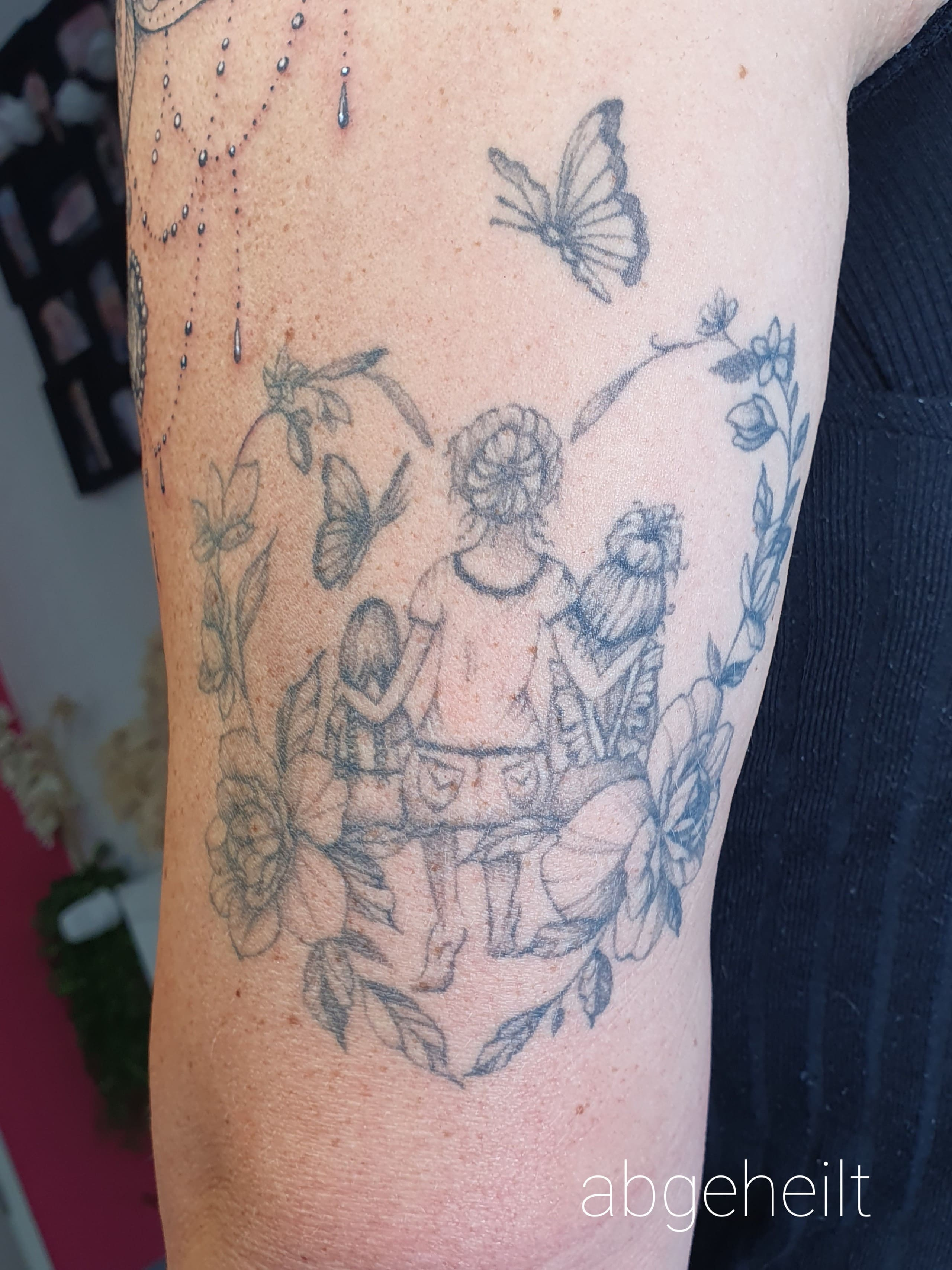florales Tattoo Frau und Kinder